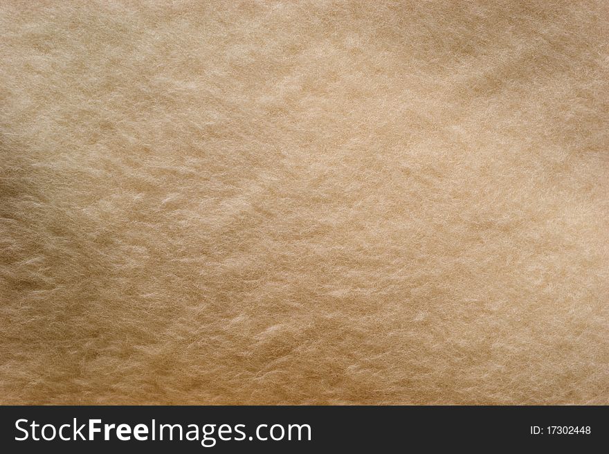 The background of textured bright synthetic fabric closeup