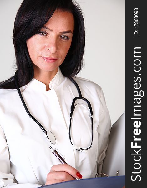 Smiling medical doctor woman with stethoscope