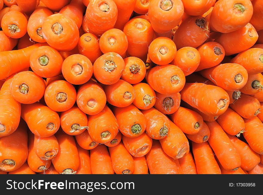 Hundred of red carrots stack up nicely for background usage.