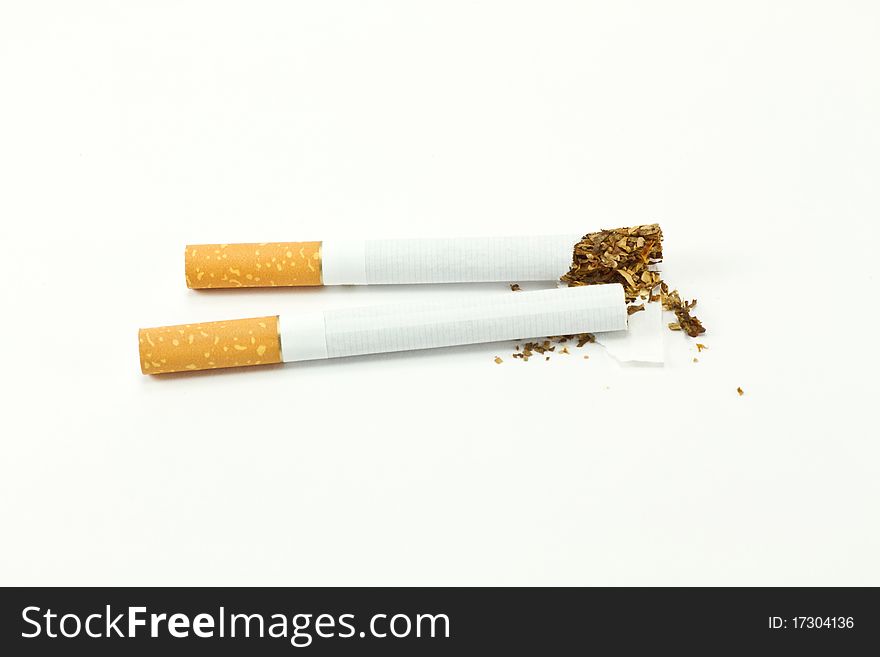 Broken cigarette isolated on white