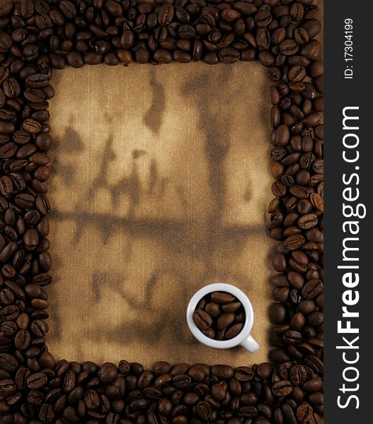 Coffee bean frame on aged paper. Coffee bean frame on aged paper