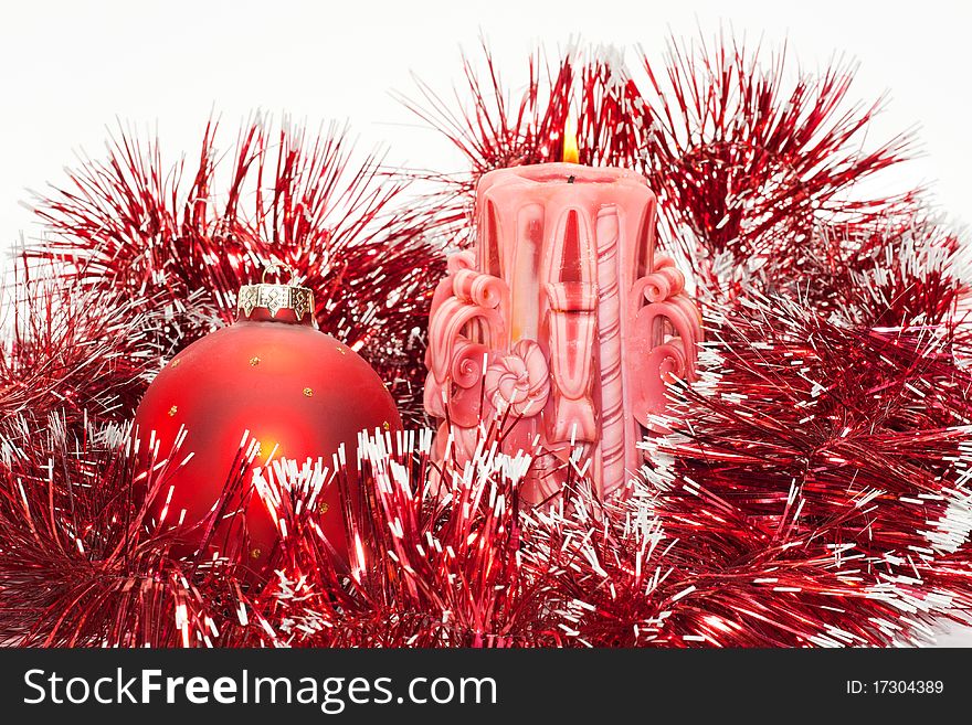 New-year red ball with burning candles and by a shower. New-year red ball with burning candles and by a shower