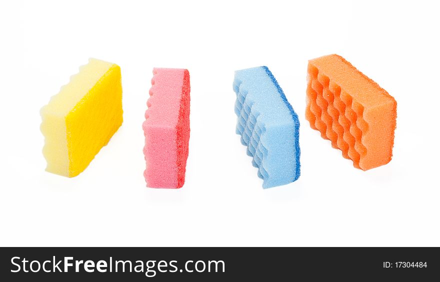 Bath sponges are foam rubbers, kitchens, varicoloured isolated on a white background. Bath sponges are foam rubbers, kitchens, varicoloured isolated on a white background