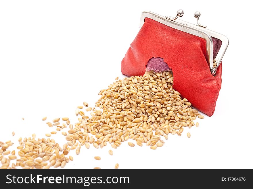 Red purse with hole and wheat on white