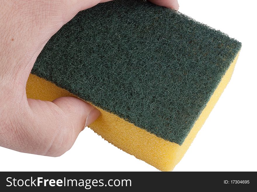 Yellow synthetic sponge for cleaning the men's hand.