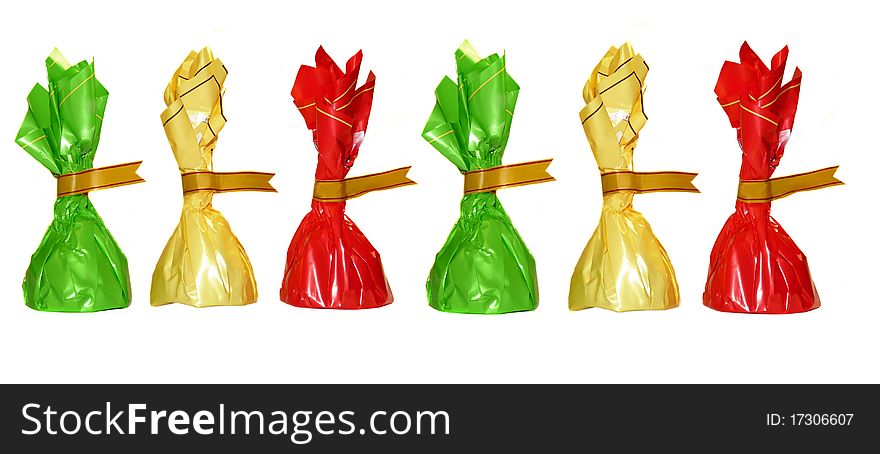 Chocolates in colorful wrappers, isolated on white