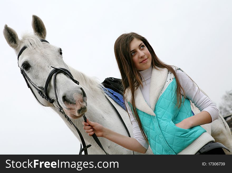 The girl and grey horse. The girl and grey horse