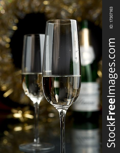 Champagne in glasses on a black background. Champagne in glasses on a black background