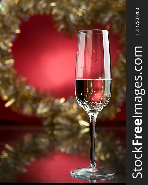 Champagne in glasses on a red background. Champagne in glasses on a red background