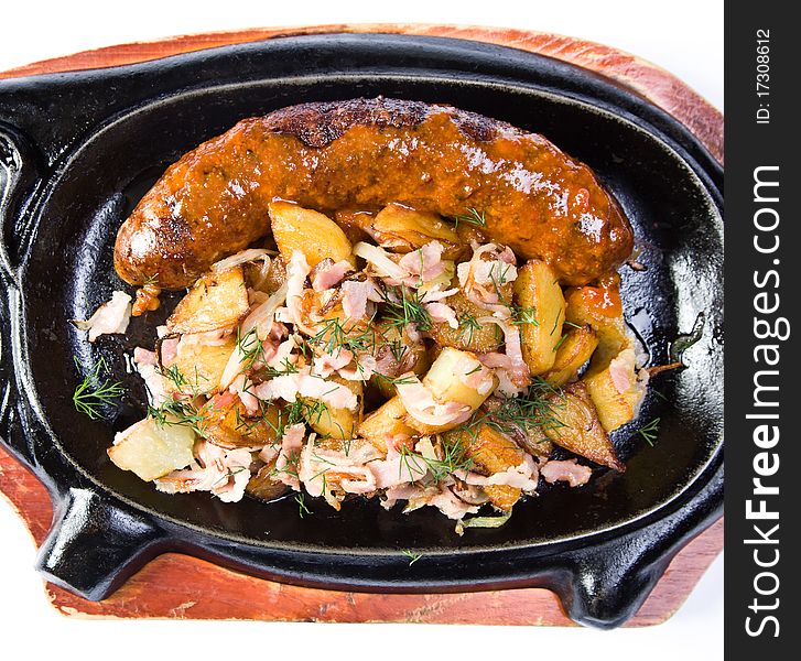 Fried potatoes with sausages