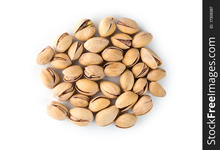 Ripe pistachios isolated on a white background. Ripe pistachios isolated on a white background