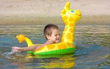 Child Swims In The River Royalty Free Stock Photos