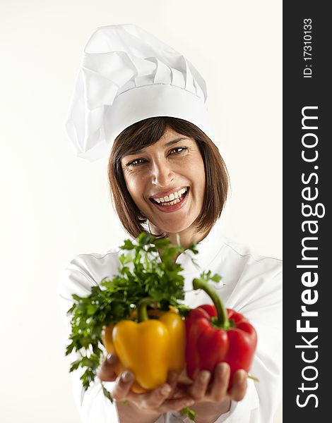 Cheerful Female Chef With Vegetables