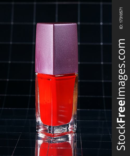 Red nail polish with reflexion