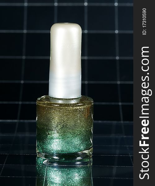 Nail polish green nacre with reflexion