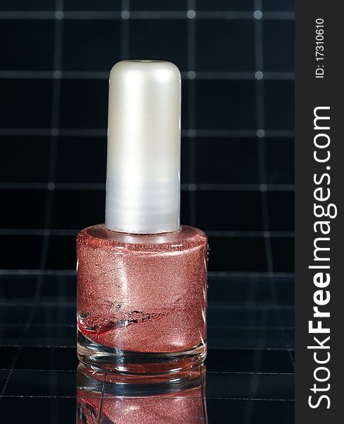 Nail polish pink nacre with reflexion