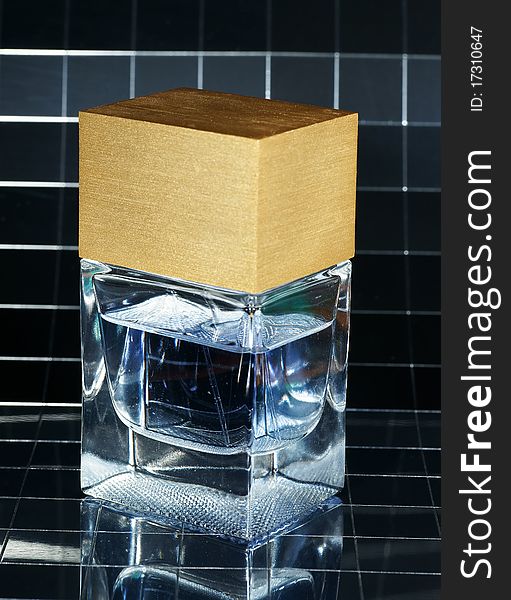 Bottle of perfume with reflexion