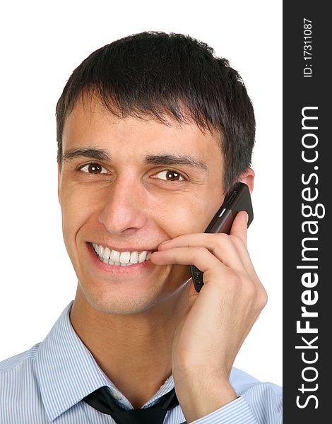 Closeup portrait of a happy young man speaking on the cellphone. Closeup portrait of a happy young man speaking on the cellphone