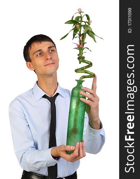 Young business man hold flower. Isolated on white