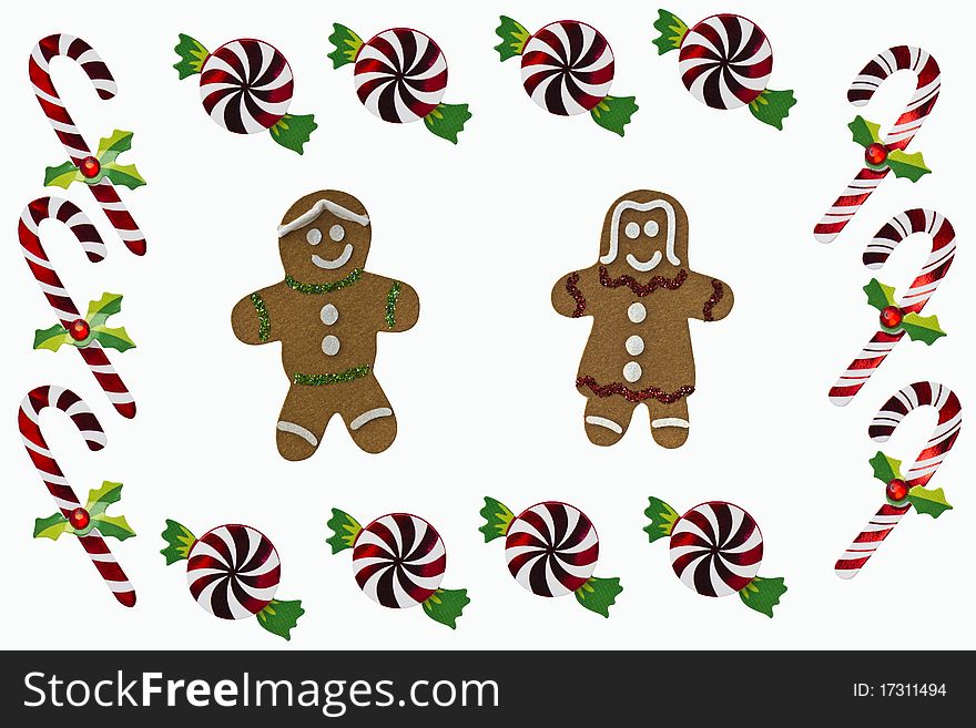 Gingerbread boy and girl and Christmas Candy isolated on a white background. Gingerbread boy and girl and Christmas Candy isolated on a white background