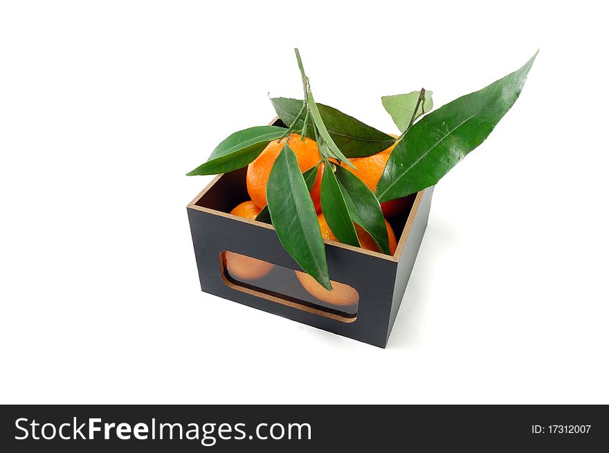 The box with tangerines is isolated on a white background