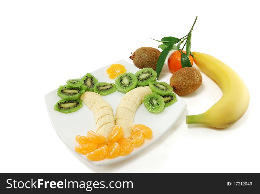 The fruit dessert and fruit are isolated on a white background