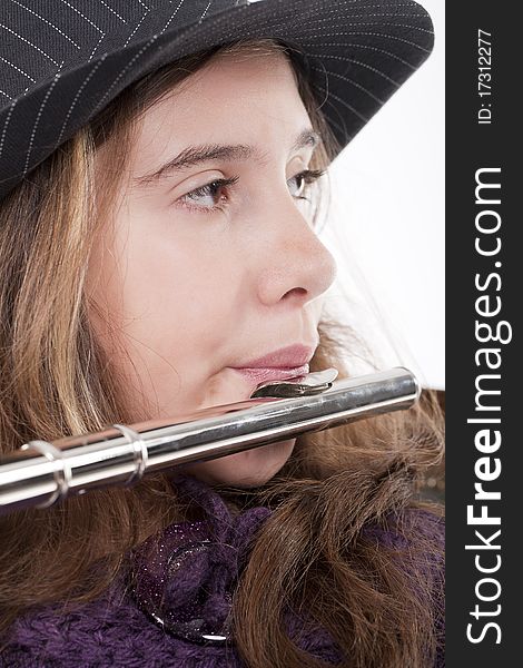 Young girl playing flute