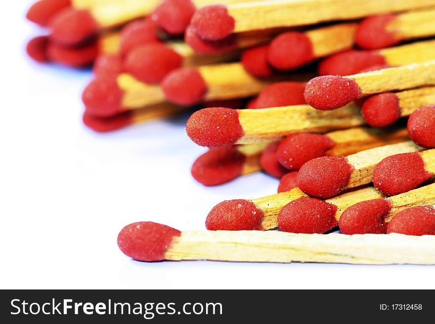 Wooden matches on white background