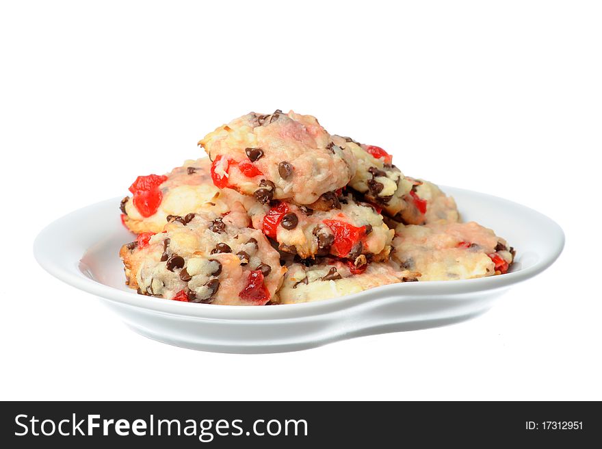 Plate of fresh homemade chocolate chip and cherry christmas cookies. Plate of fresh homemade chocolate chip and cherry christmas cookies.