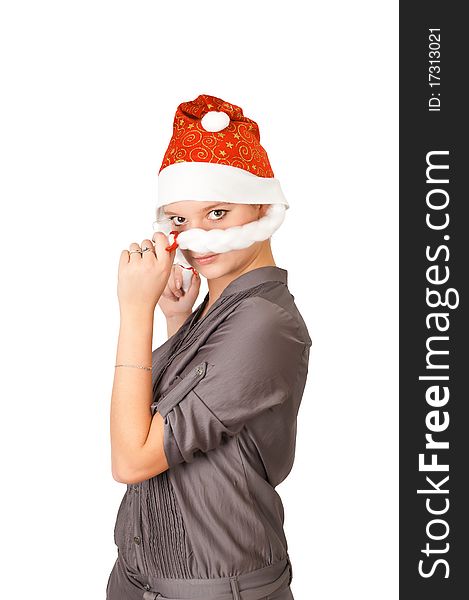 Young woman in a Santa Claus hat on white background