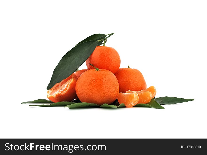 Tangerines with leaves on white background