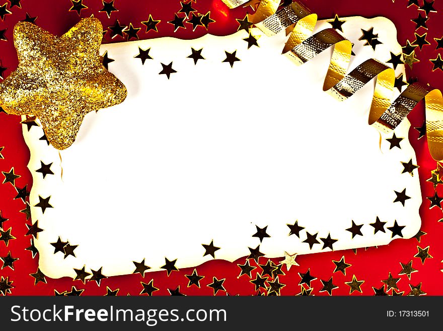 On a red background white greeting card with golden stars. On a red background white greeting card with golden stars.