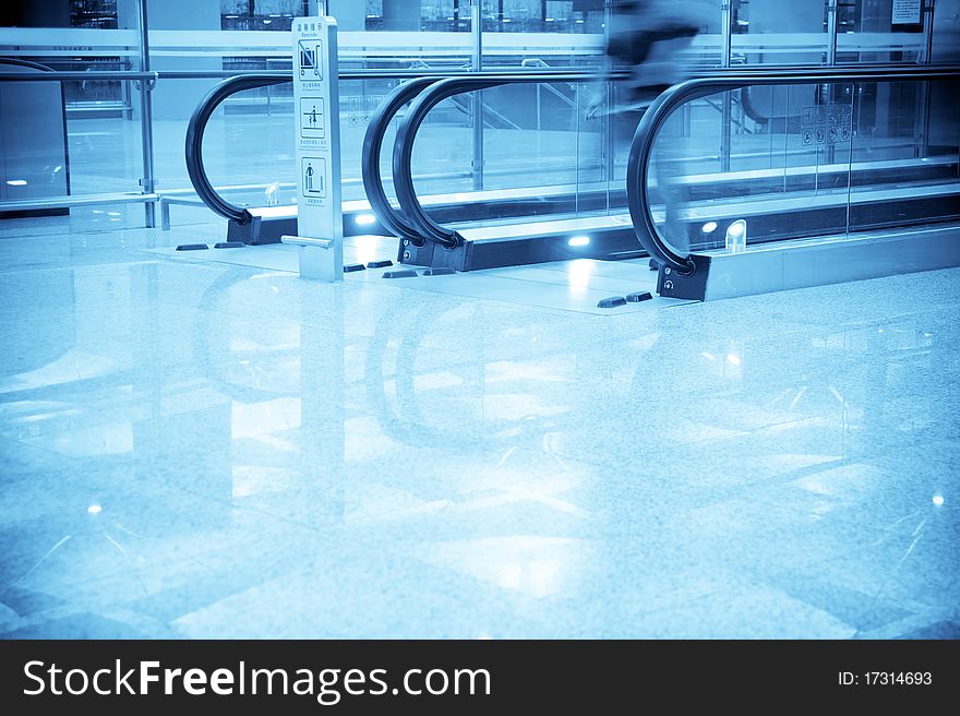 Airport Scene - People Walking Fast In The Airport