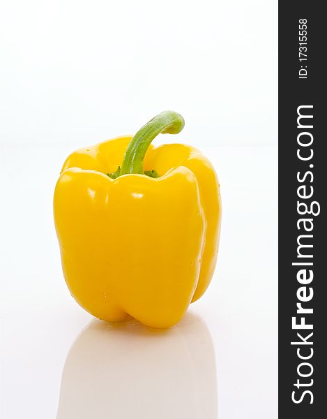 Close-up of organic yellow bell pepper, isolated in white.