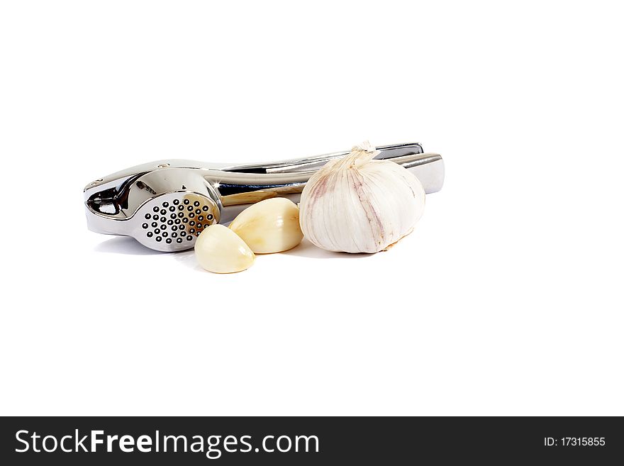 Garlic press isolated on white