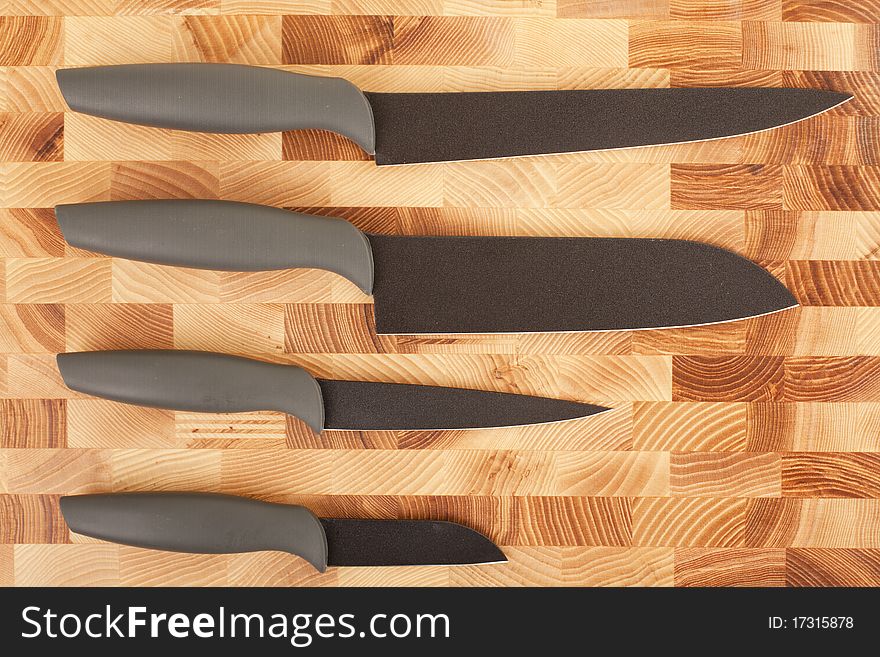 Series. kitchen knife isolated on wooden background. Series. kitchen knife isolated on wooden background
