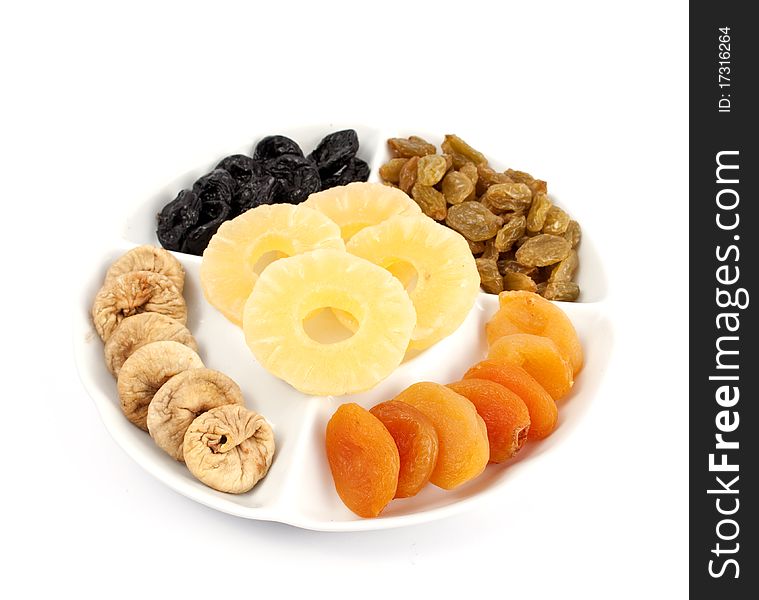 Different kinds of dried fruits on white background