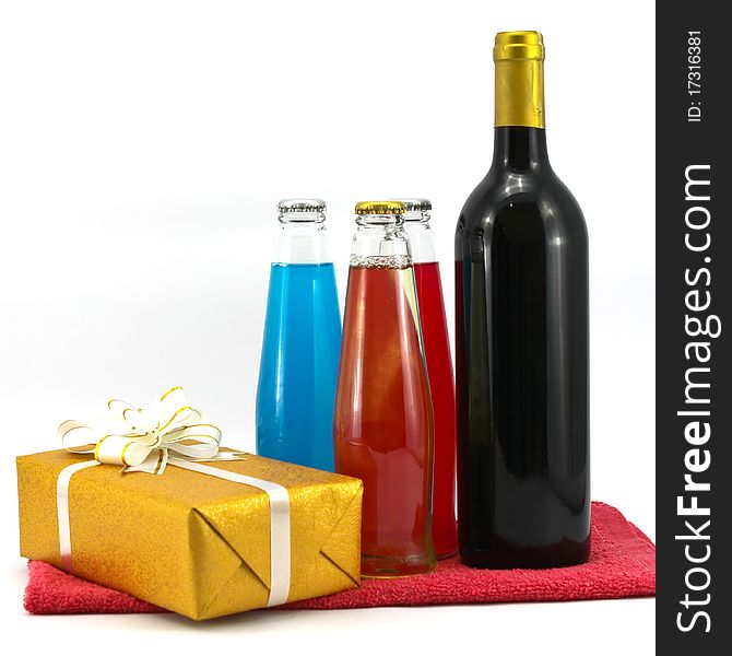 Wine bottle and gift isolated on white background