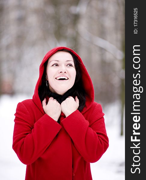 Smiling young beautiful girl in the red coat. Smiling young beautiful girl in the red coat