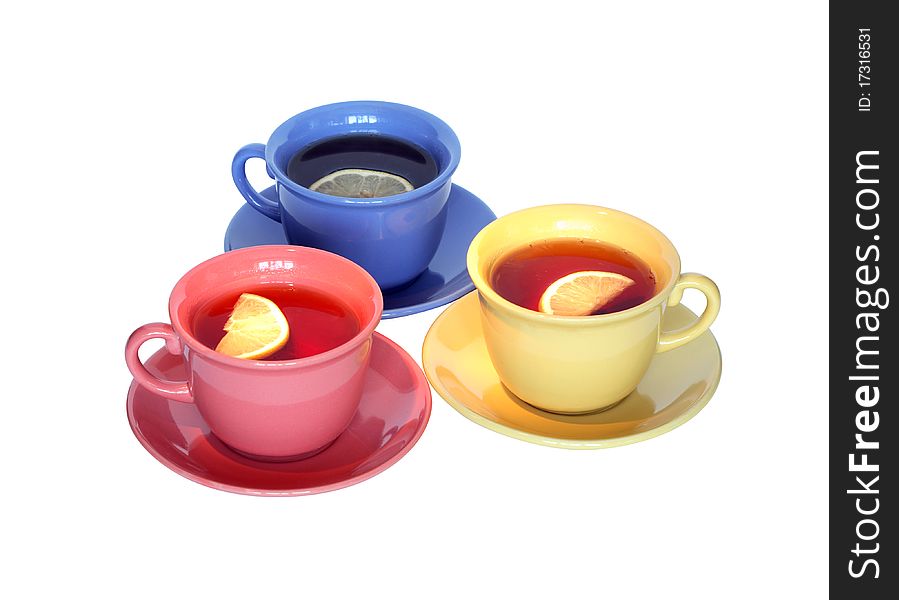 Three color cups of black tea with lemon isolated on white background with clipping path. Three color cups of black tea with lemon isolated on white background with clipping path