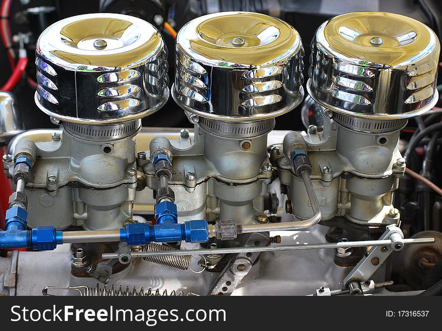 Classic custom car engine on a vintage automobile. Classic custom car engine on a vintage automobile.