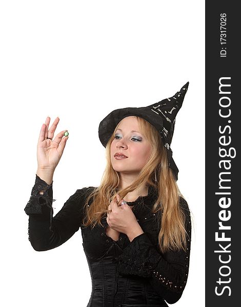 A young woman in a witch costume