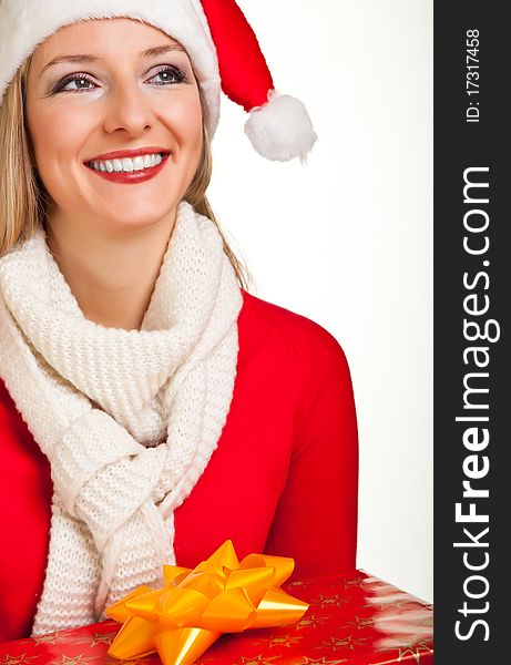 Woman in santa hat with christmas presents isolated on white background. Woman in santa hat with christmas presents isolated on white background