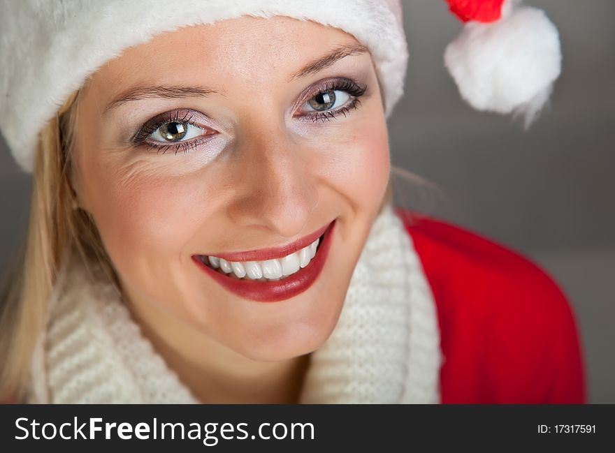 Woman In Santa Hat With Presents