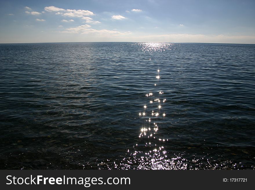 Sunset road on the calm Black sea. Russia. . Sunset road on the calm Black sea. Russia.