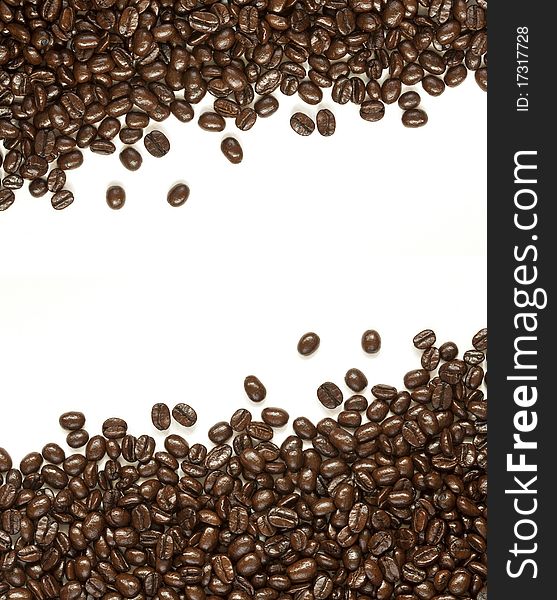 Many coffee beans on white background with copy space
