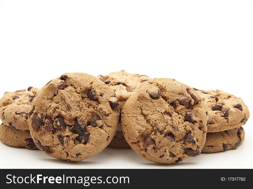 Cookies with chocolate onto white background