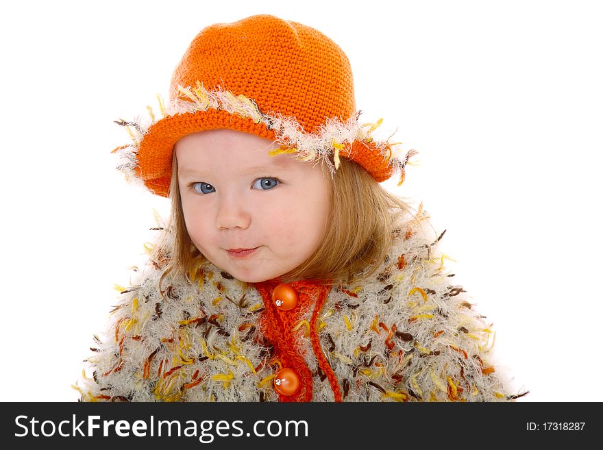 Little girl in orange hat smiling at camera  on white background. Little girl in orange hat smiling at camera  on white background