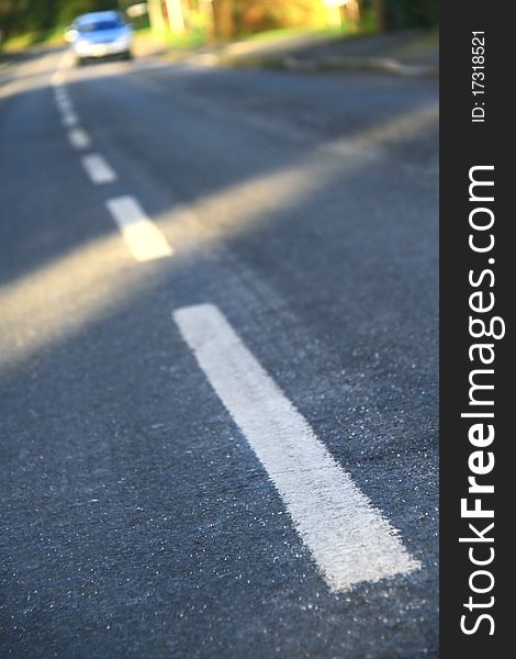 A photo of  road markings on a country road. A photo of  road markings on a country road