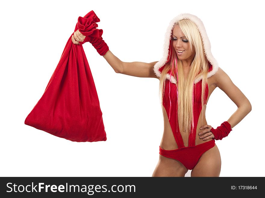 Woman in santa claus suit with gift bag